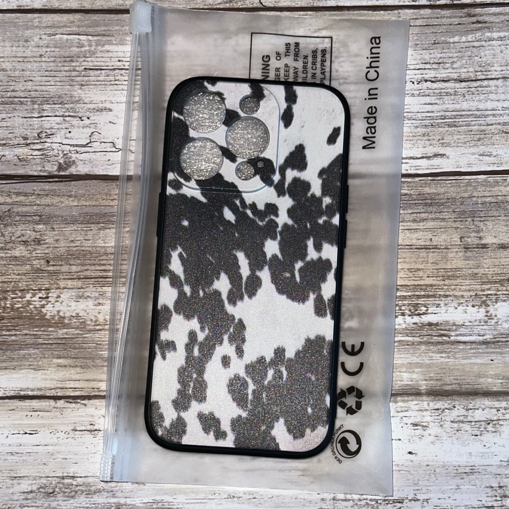 14 Pro Cowhide Print Phone Case